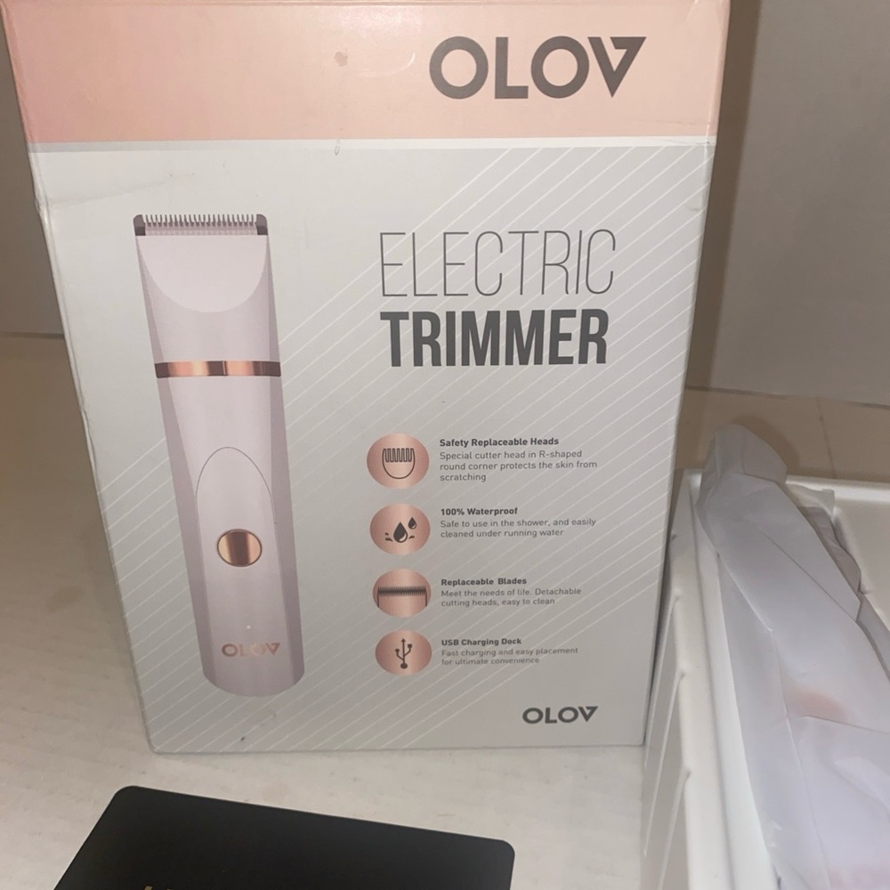 OLOV electric trimmer, body groomer, new